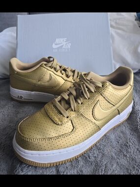 Nike Air Force 1 Low Top Sneakers in Metallic Gold